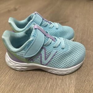 Kids New Balance Light Blue and Purple Sneakers